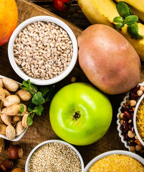 woman talking online with a bun getting perimenopause coaching online